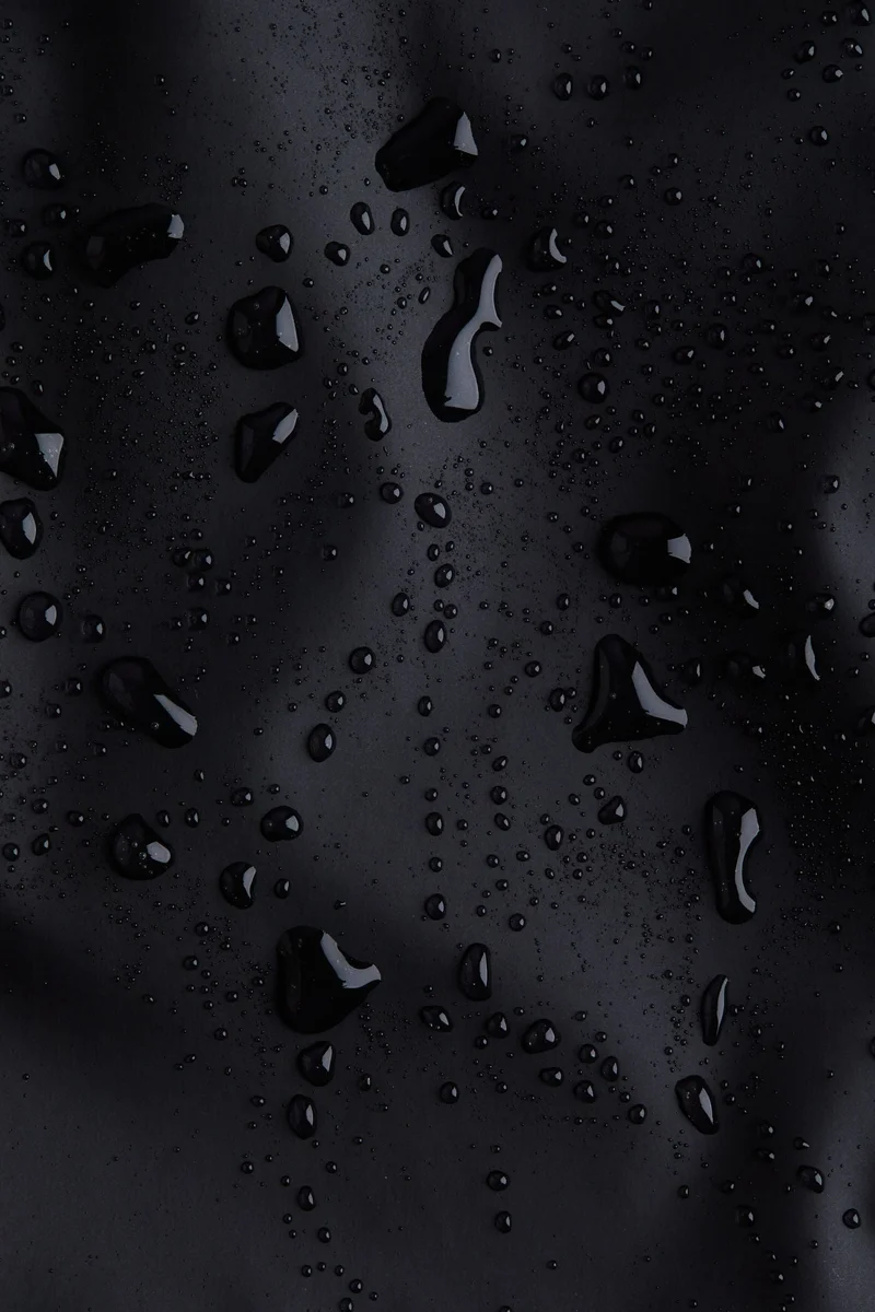 اتش اند ام جاكيت من نسيج مقاوم للمطر